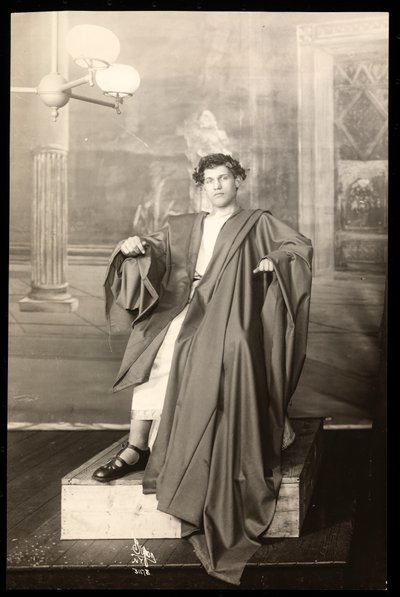 A young actor in the costume of Julius Caesar of the set of an amateur production of Julius Caesar by Byron Company